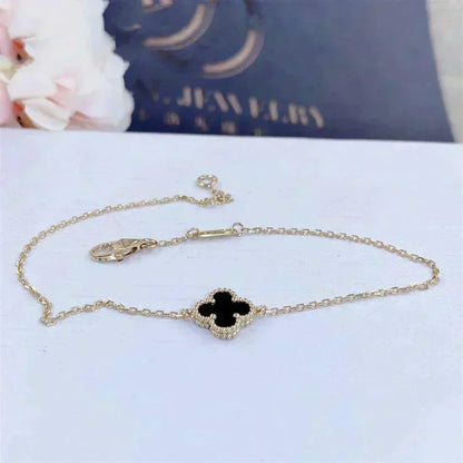 {
"Bling Jewelrys ": "Bling Jewelry ",
"CLOVER ONYX SINGLE FLOWER BRACELET": "KLEEBLATT ONYX EINZELBLUMEN-ARMBAND"
}