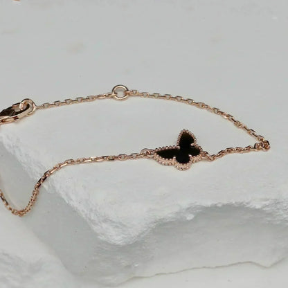 {
  "Bling Jewelrys": "ブリングジュエリー",
  "BUTTERFLY ONYX  BUTTERFLY BRACELET": "バタフライ オニキス バタフライ ブレスレット"
}