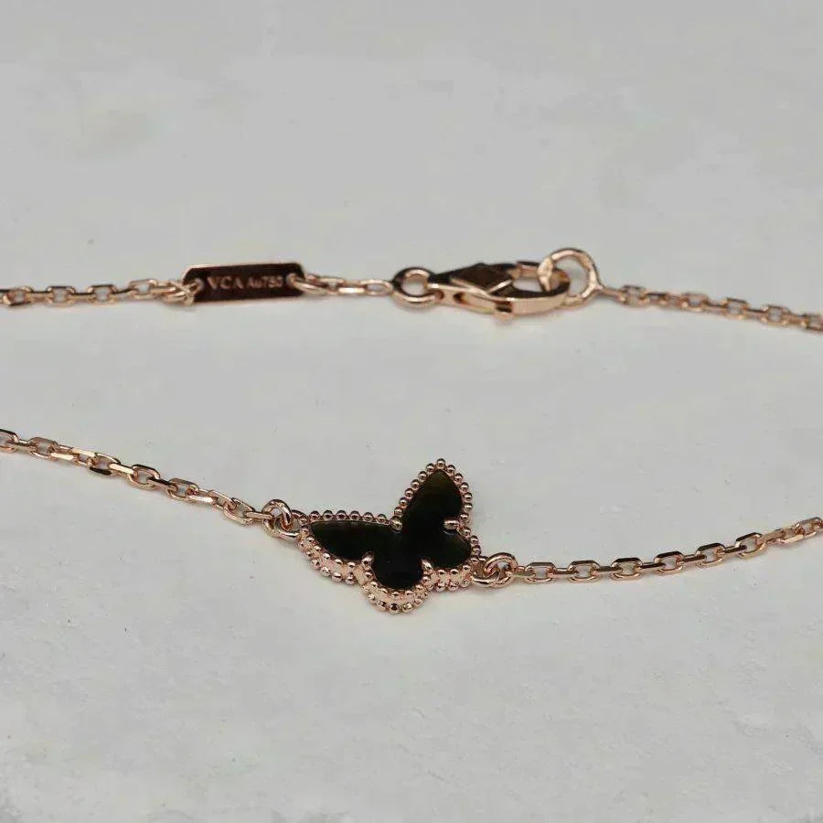 {
  "Bling Jewelrys": "ブリングジュエリー",
  "BUTTERFLY ONYX  BUTTERFLY BRACELET": "バタフライ オニキス バタフライ ブレスレット"
}