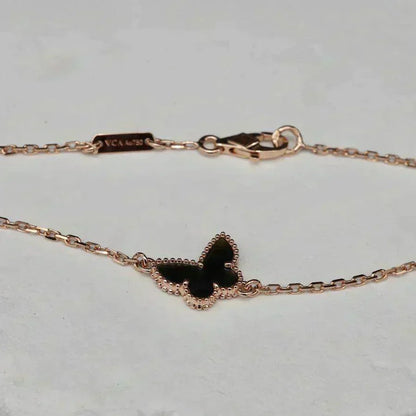 {
  "Bling Jewelrys": "ブリングジュエリー",
  "BUTTERFLY ONYX  BUTTERFLY BRACELET": "バタフライ オニキス バタフライ ブレスレット"
}