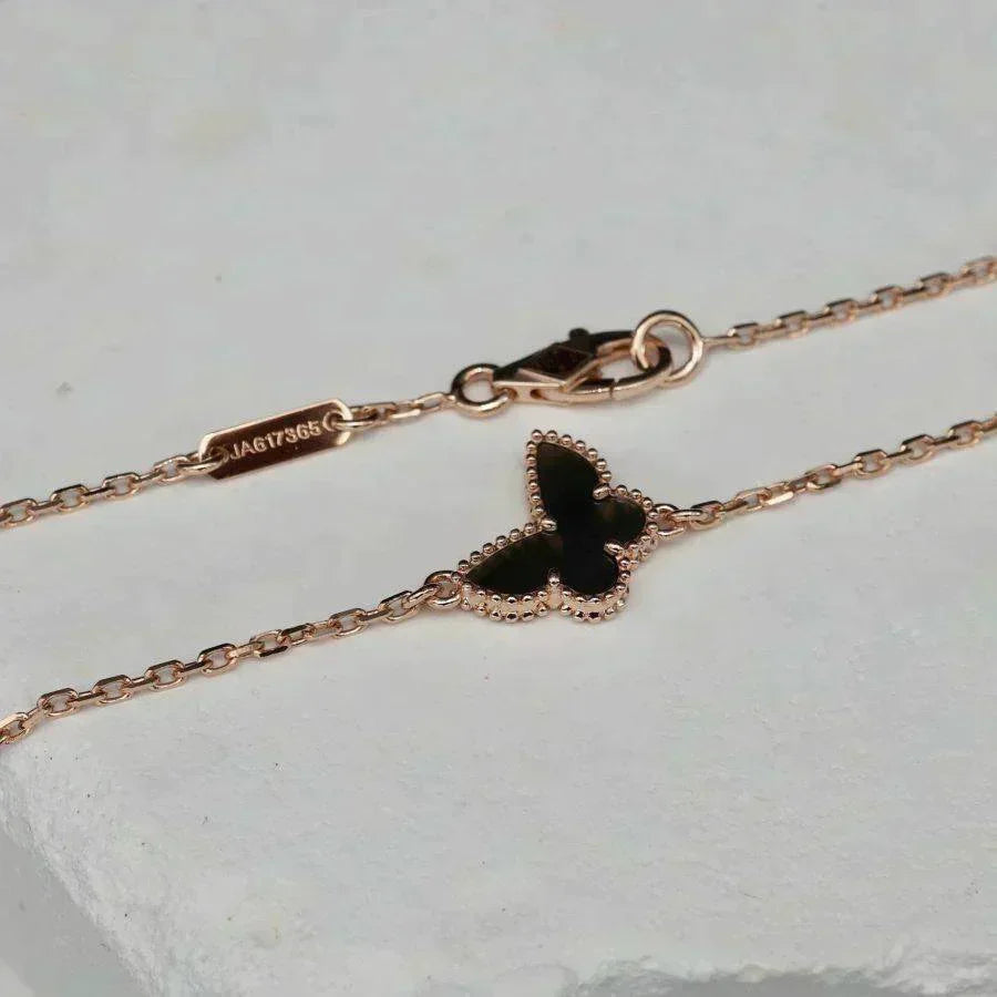 {
  "Bling Jewelrys": "ブリングジュエリー",
  "BUTTERFLY ONYX  BUTTERFLY BRACELET": "バタフライ オニキス バタフライ ブレスレット"
}