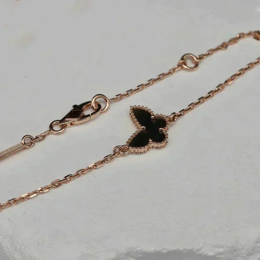 {
  "Bling Jewelrys": "ブリングジュエリー",
  "BUTTERFLY ONYX  BUTTERFLY BRACELET": "バタフライ オニキス バタフライ ブレスレット"
}