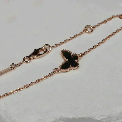 {
  "Bling Jewelrys": "ブリングジュエリー",
  "BUTTERFLY ONYX  BUTTERFLY BRACELET": "バタフライ オニキス バタフライ ブレスレット"
}